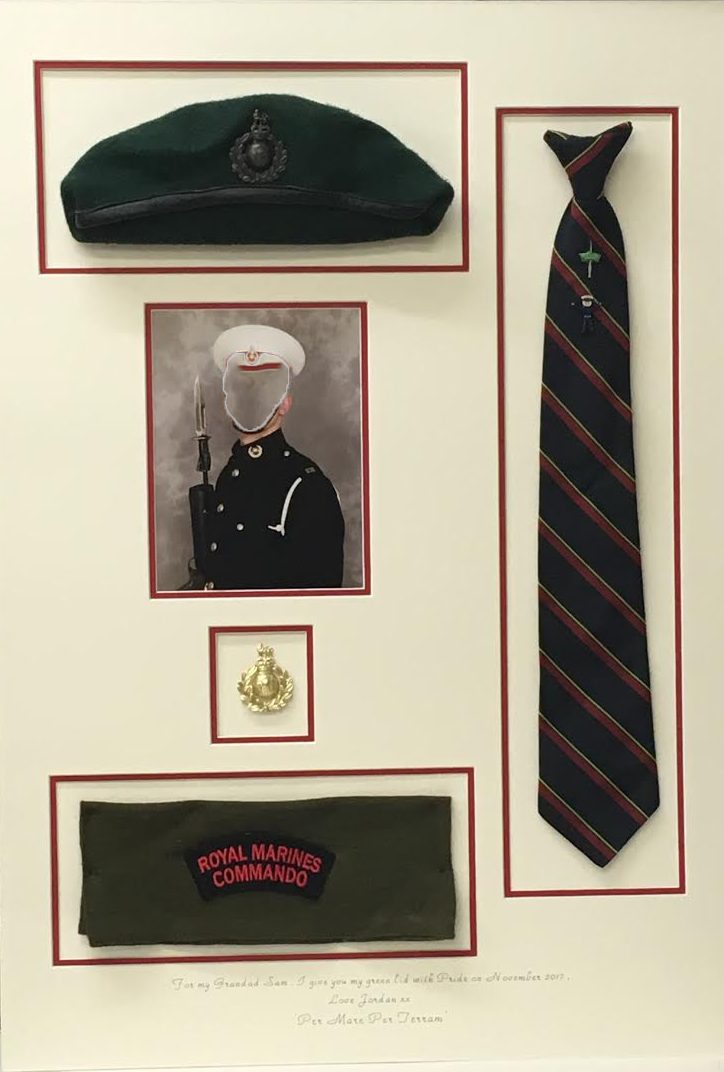 Framed royal marines tie, hat and memorabilia